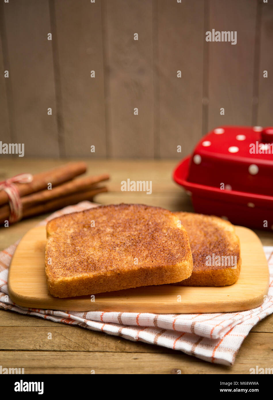 Classic Cinnamon Toast on a Rustic Wooden Table Stock Photo - Alamy