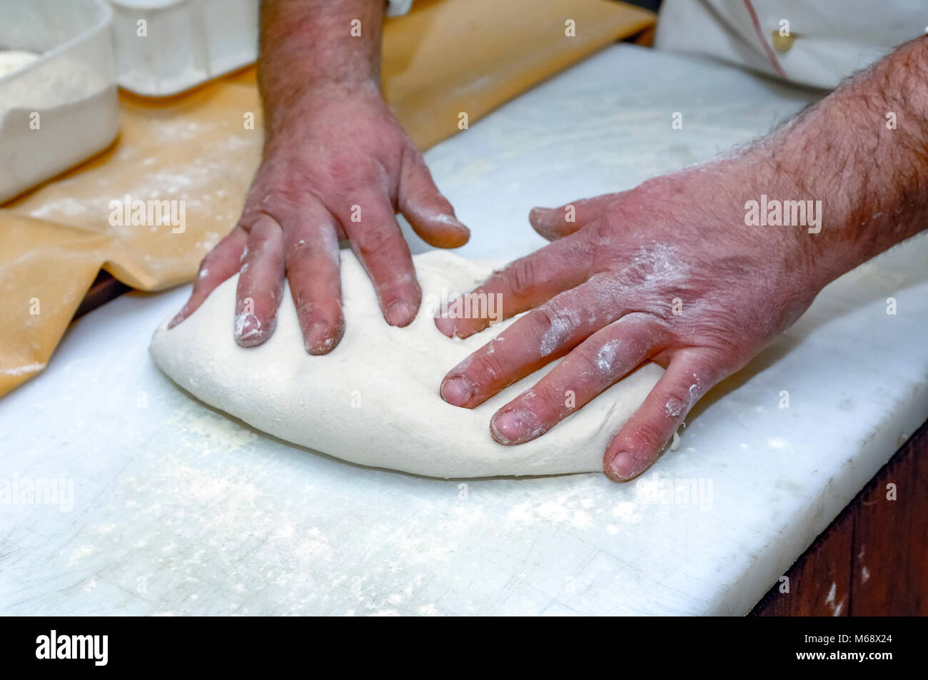 Italy Basilicata Lucan National Park of the ApenninesMarsico Nuovo - Baker prepares dough for bread Stock Photo