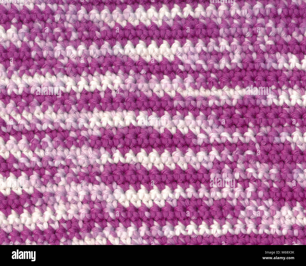 Background - crochet - white and purple variegated yarn Stock Photo
