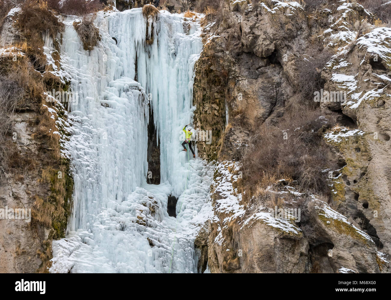 Elijah Weber climbing Lower Falls Right rated WI4 Near Shoshone Falls in Idaho Stock Photo