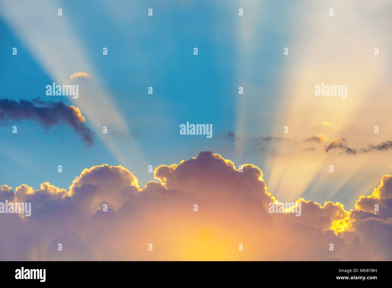 Blue sky with clouds and sun Stock Photo - Alamy