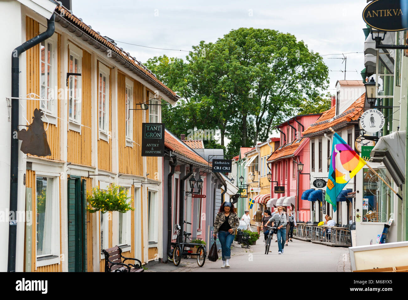 Traditional wooden houses on Stora Gatan street in heart of old town. Sigtuna, Sweden Stock Photo