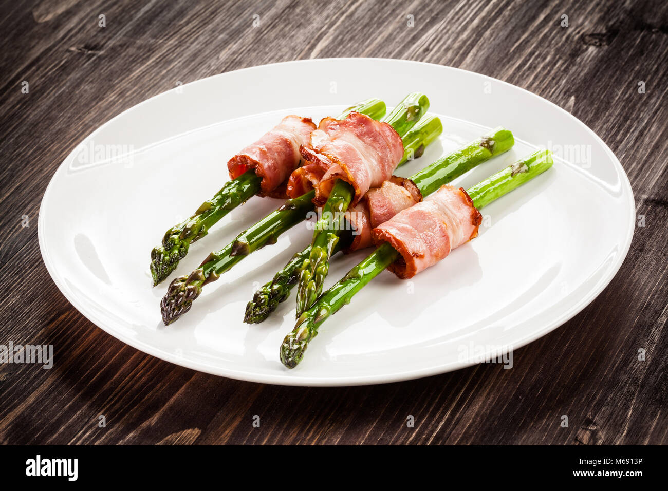 Asparagus and fried bacon Stock Photo Alamy
