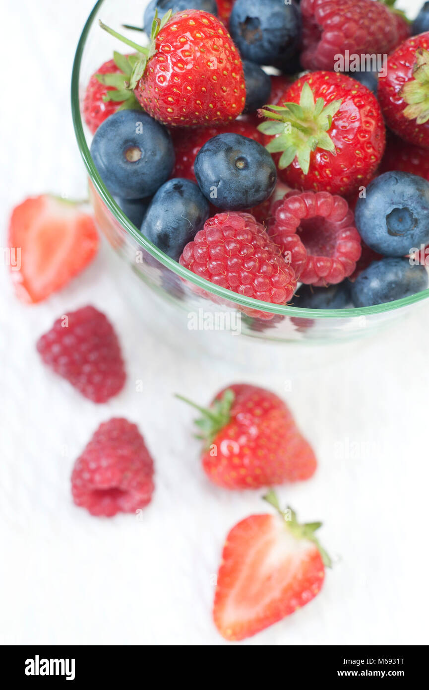Berries in glass bowl Stock Photo