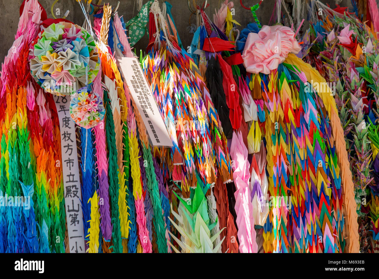 Paper cranes and ribbons around the Hiroshima Peace Memorial Park