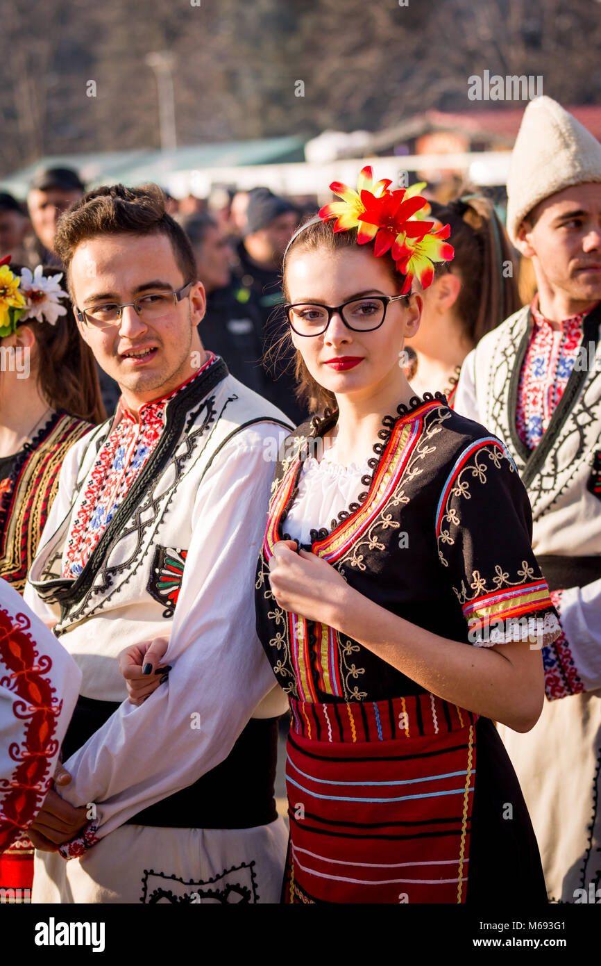 PERNIK, BULGARIA - JANUARY 26, 2018: Couple dancers in Bulgarian