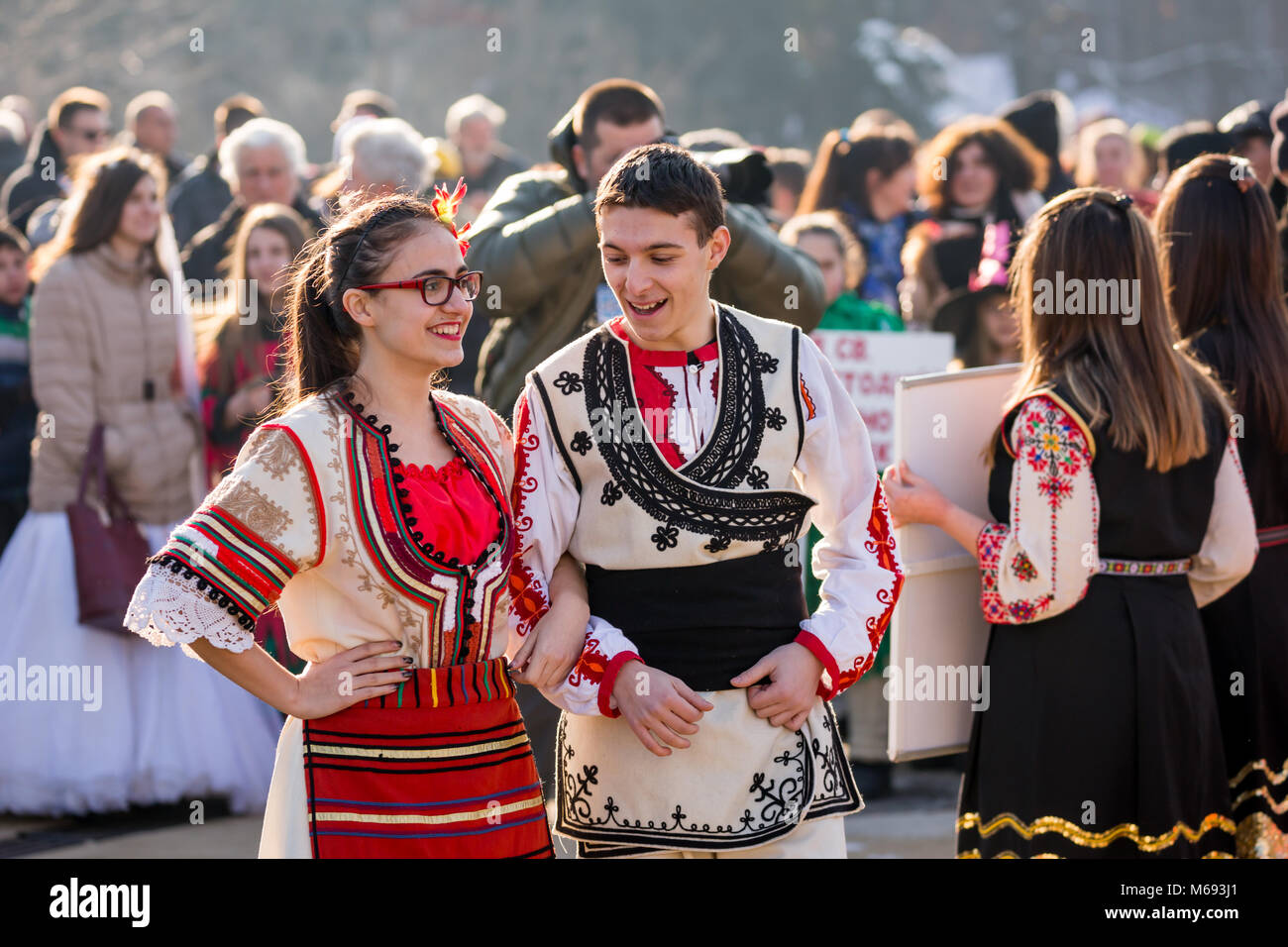 PERNIK, BULGARIA - JANUARY 26, 2018: Two dancers in Bulgarian folk