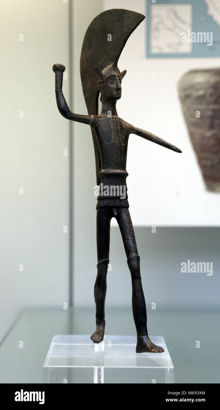 Bronze votive figure of a warrior with an Attic helmet. Umbrian, about 500-475 BC. Cuirass and flaps. Etruscan. Italy. Stock Photo