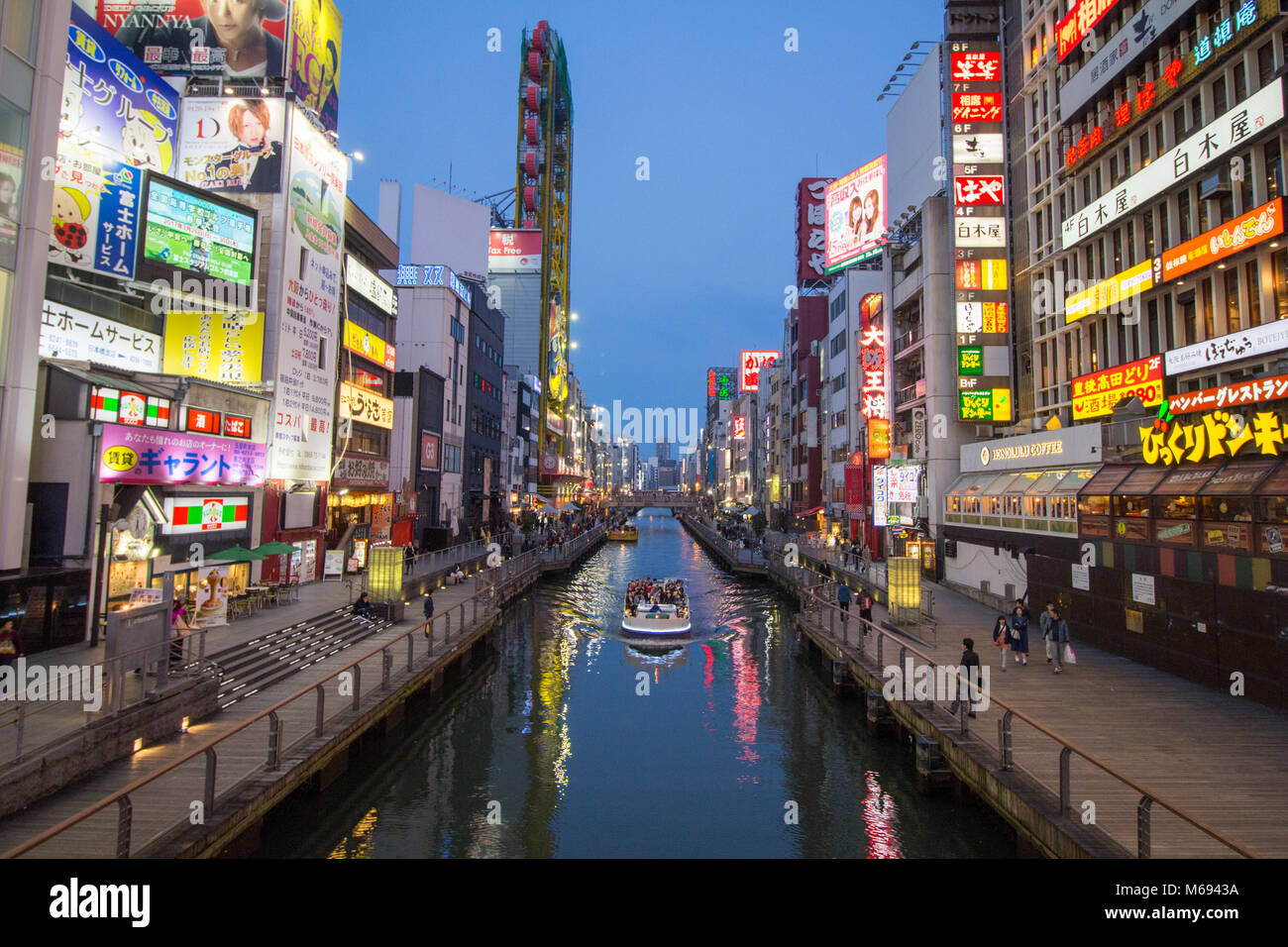 Early evening nightlife in the busy area around Dotonbori, Osaka, Japan Stock Photo