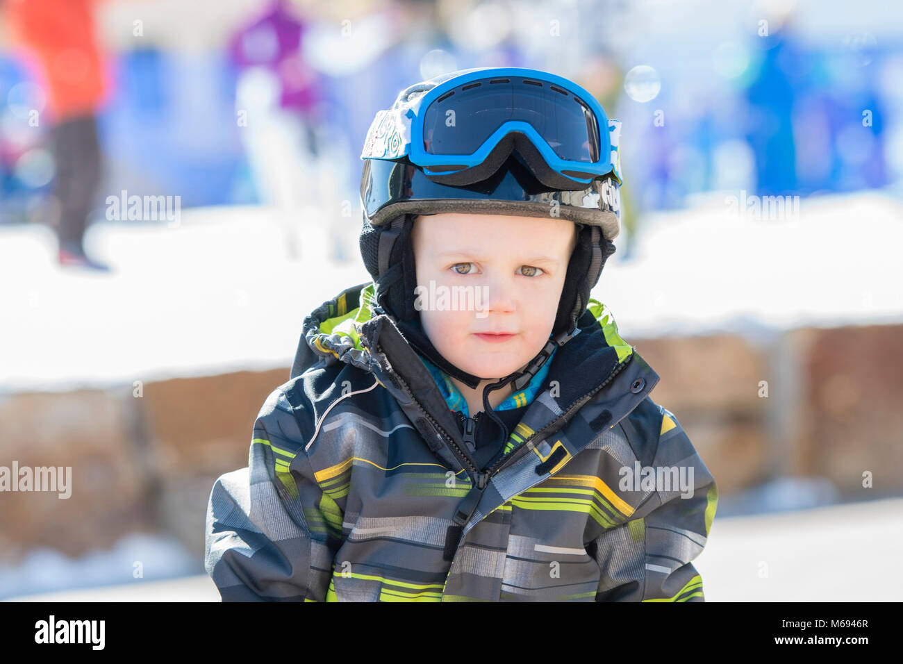 Toddler Boy Dressed Warmly & in Good Safety Gear Ready to go Ski Stock