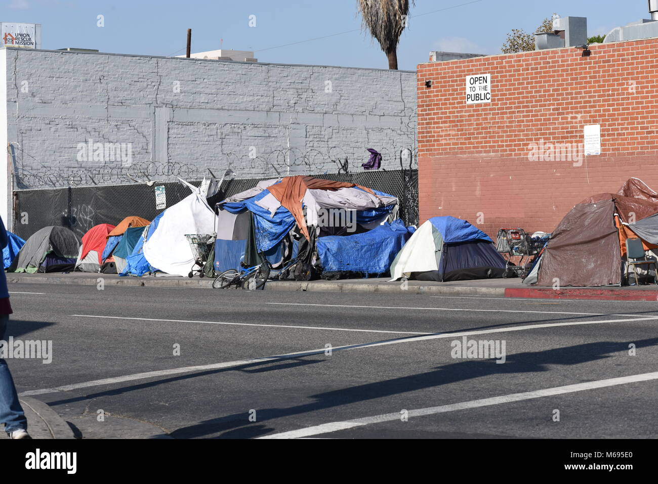 Scenes from Skid Row an area of Downtown Los Angeles which is one of the largest stable populations (between 5,000 and 8,000) of homeless people. Stock Photo