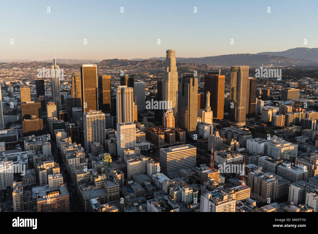 Los Angeles, California, USA - February 20, 2018:  Early morning aerial view of towers, streets and buildings in the urban core of downtown LA. Stock Photo