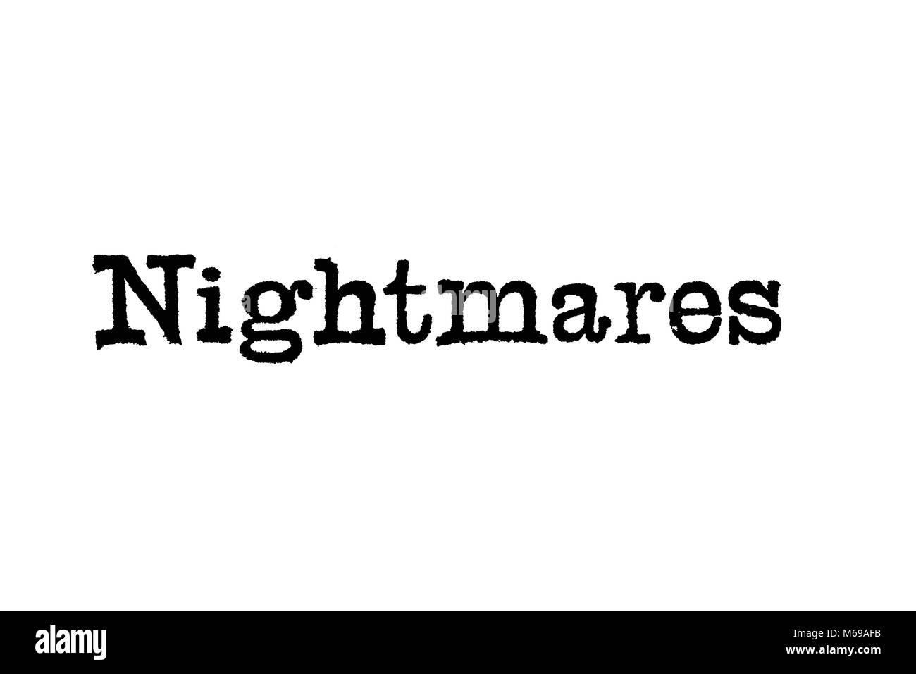 The word Nightmares from a typewriter on a white background Stock Photo