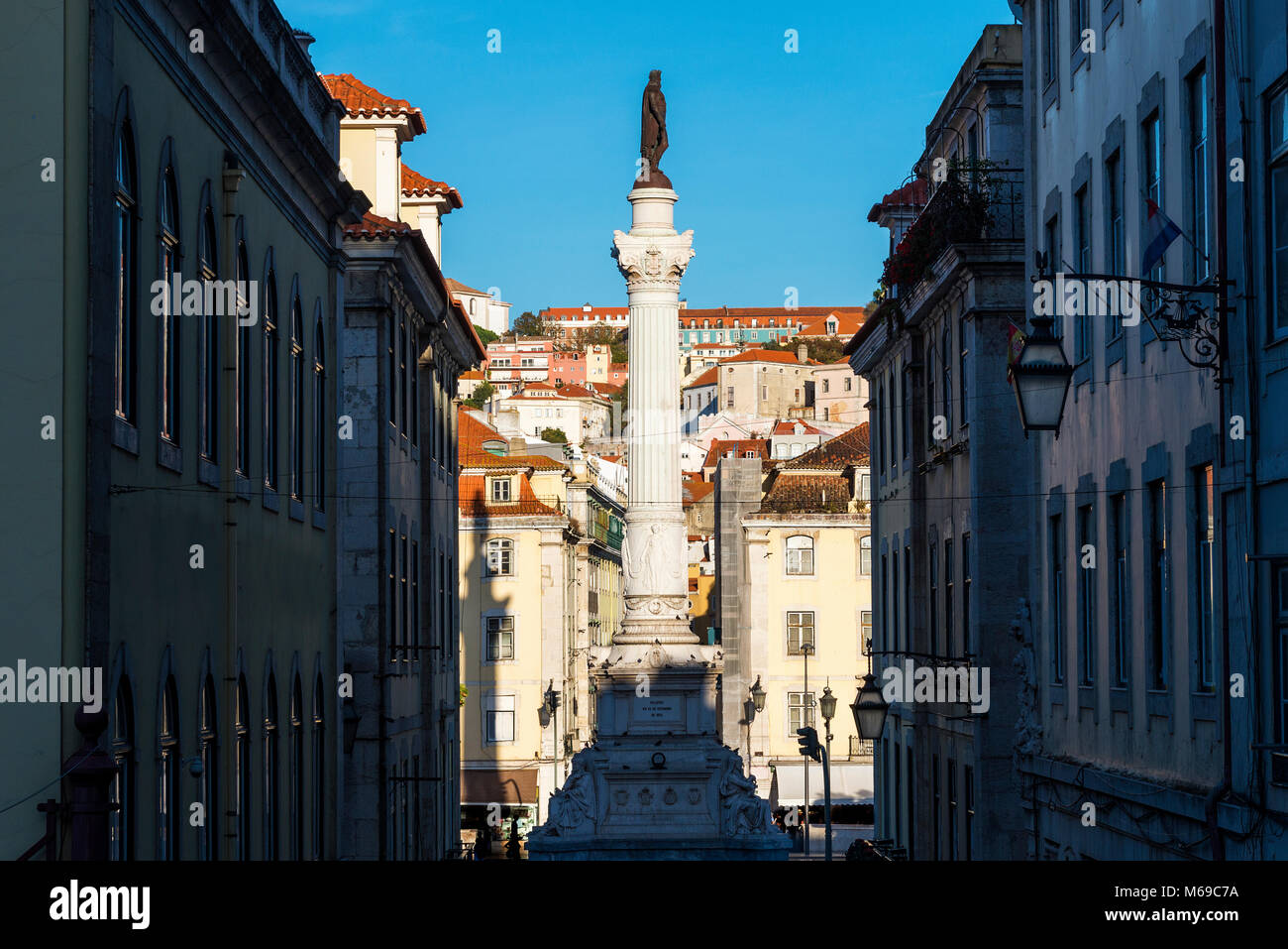 View of the Rossio Square with the statue of Pedro IV in the pombaline downtown of the city of Lisbon, Portugal; Concept for visit Lisbon Stock Photo