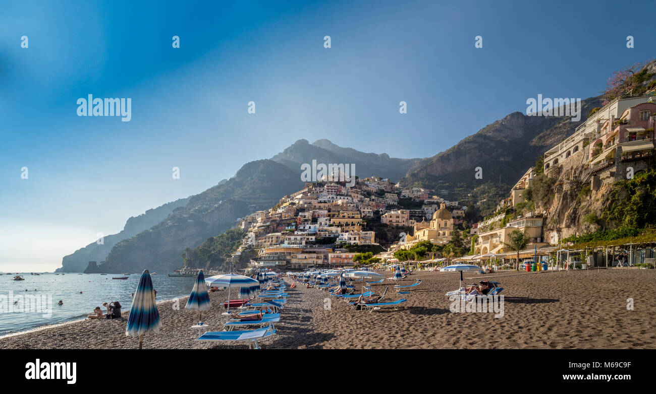 beach with sunbeds and brollies, Positano, Amalfi Coast, Italy. Stock Photo