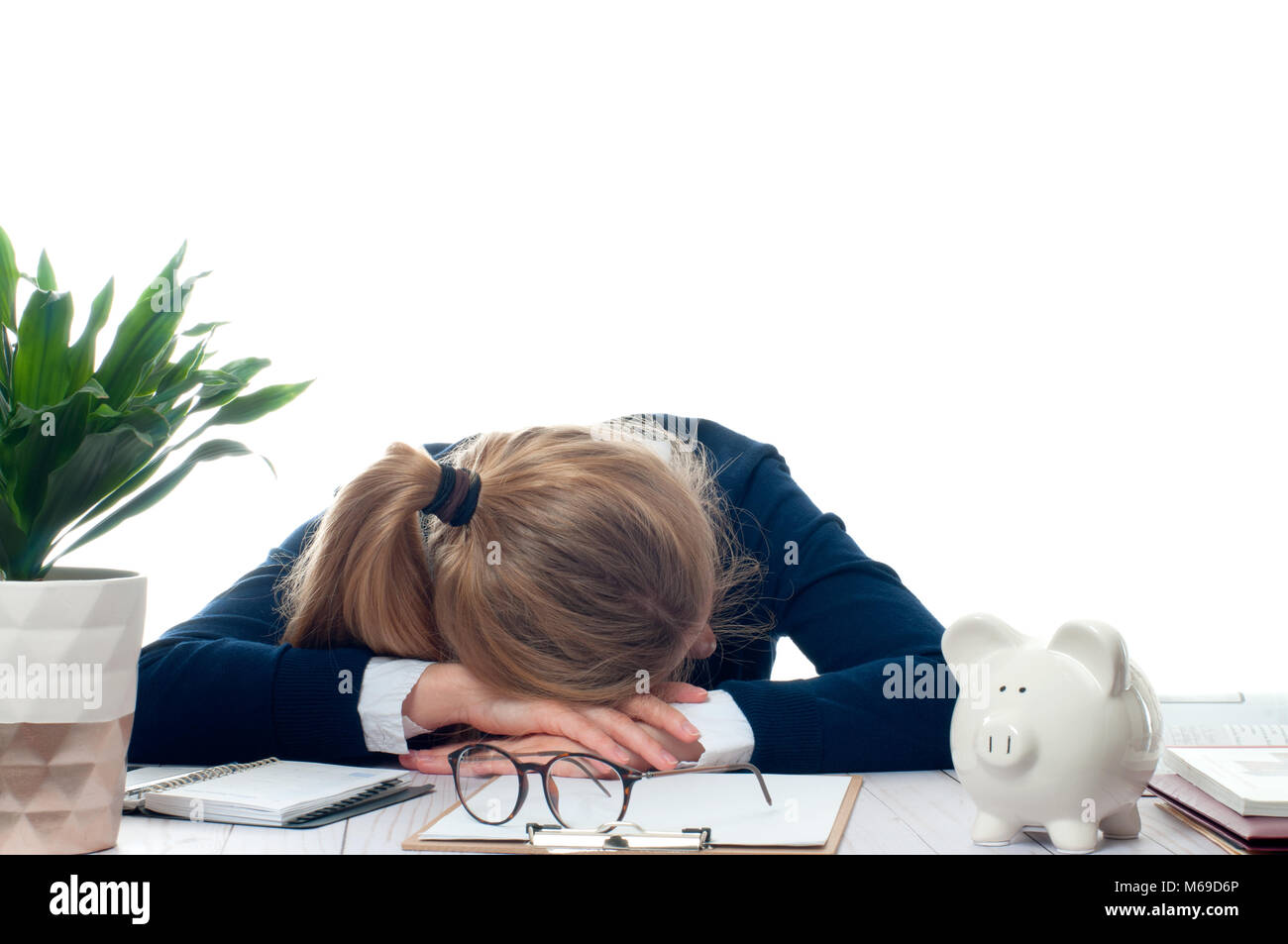 Overworked and tired young woman sleeping on desk at office, too much work Stock Photo Alamy