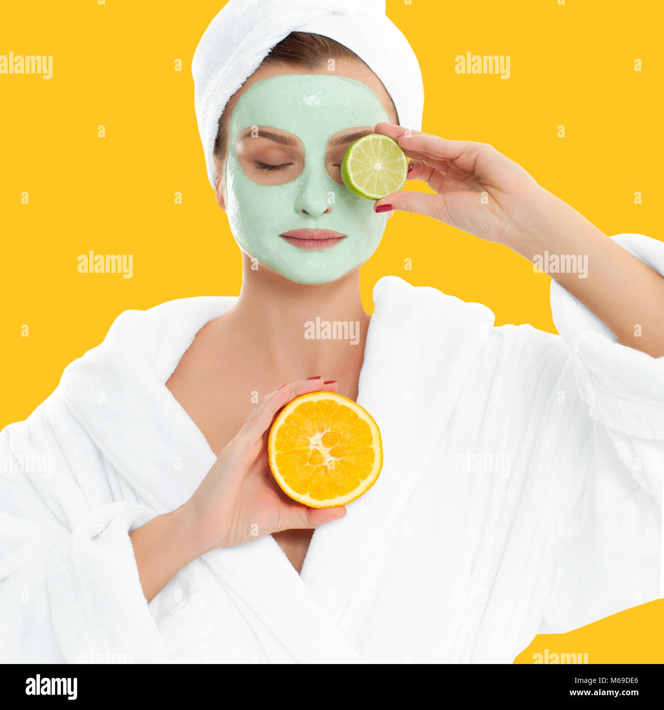 Download Beautiful Woman Is Getting Facial Clay Mask On Pastel Yellow Stock Photo Alamy PSD Mockup Templates