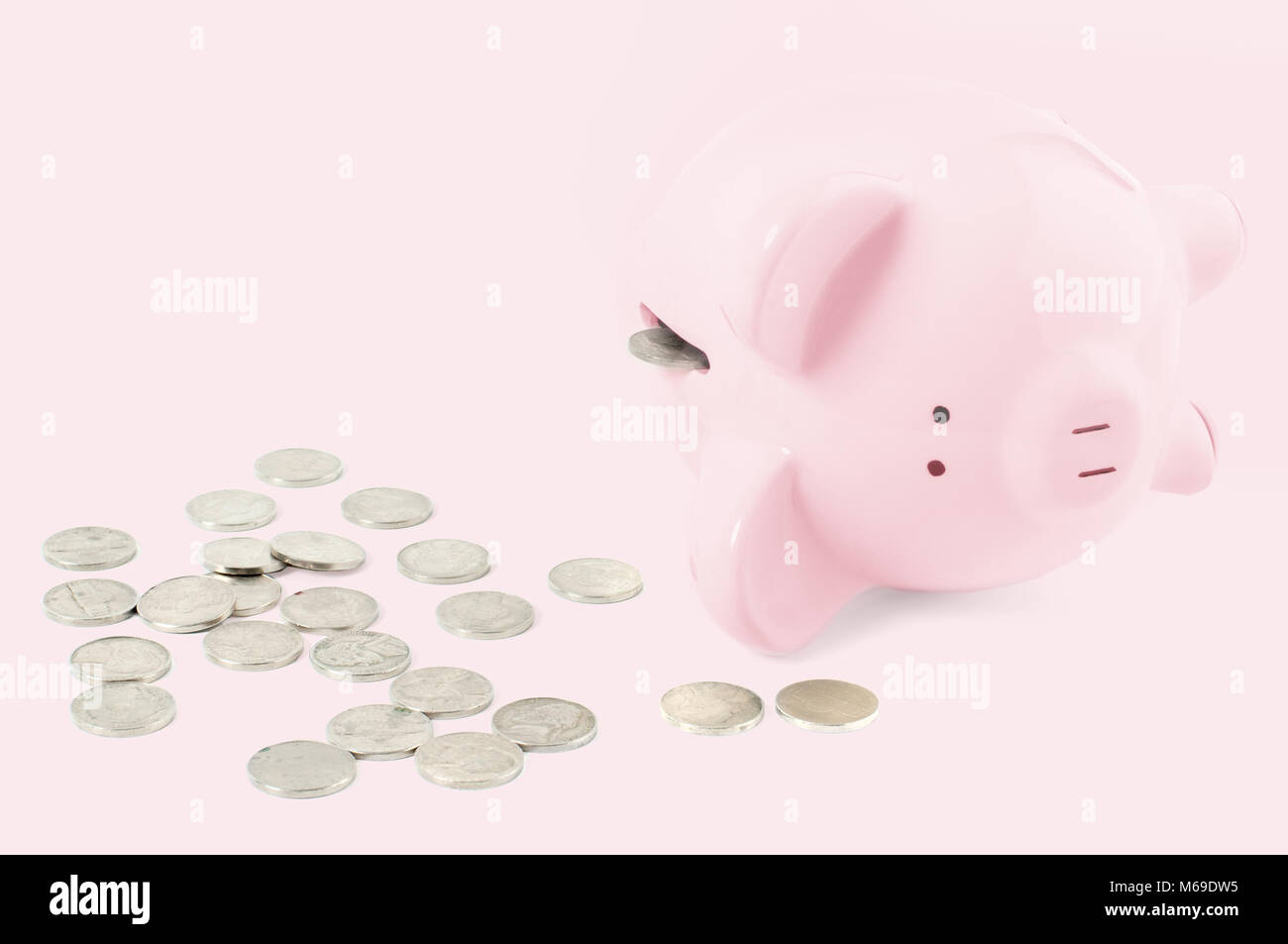 Empty pink piggy bank and coins on pastel pink background Stock Photo ...