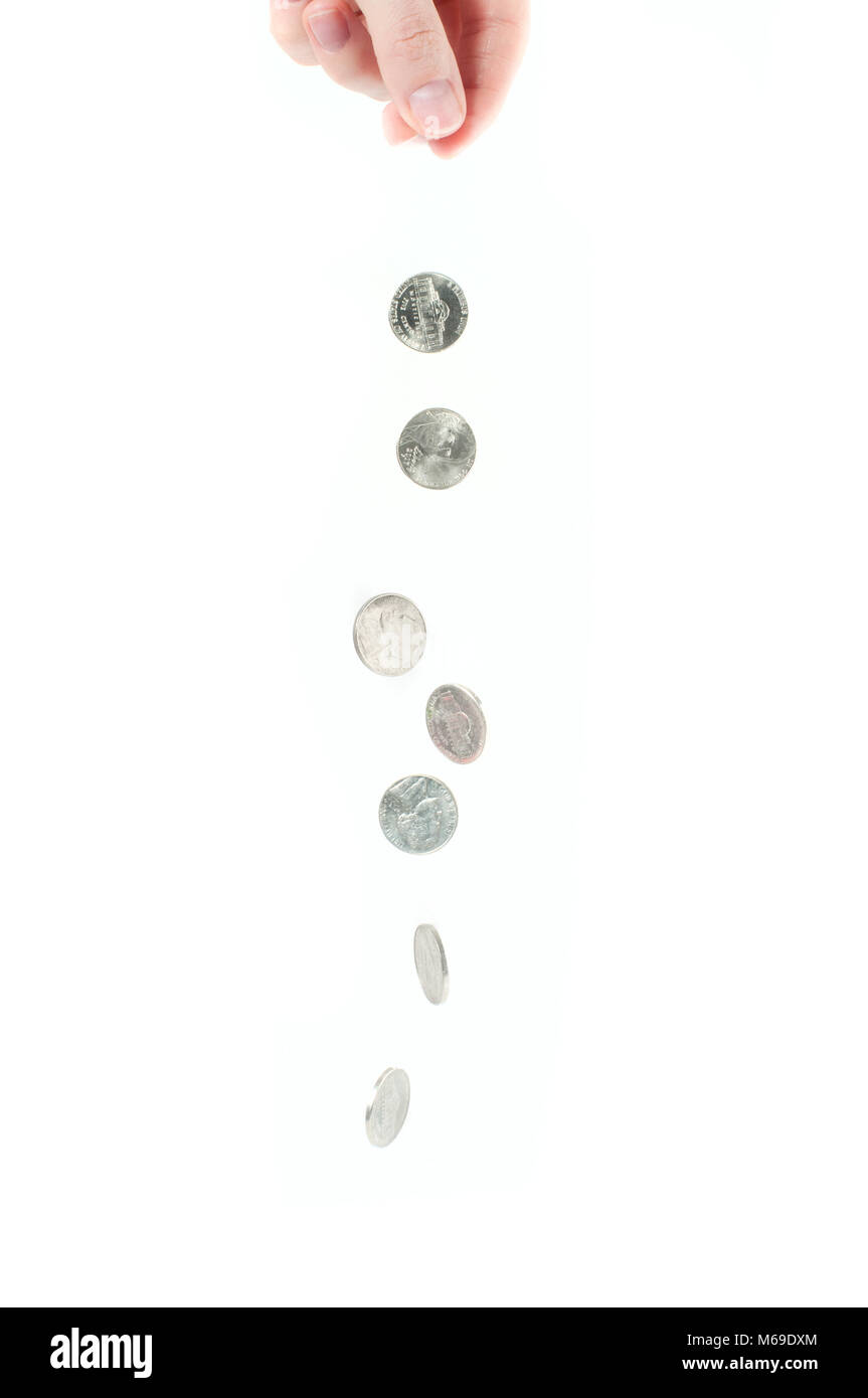 Female hand and falling coins isolated on white background Stock Photo ...