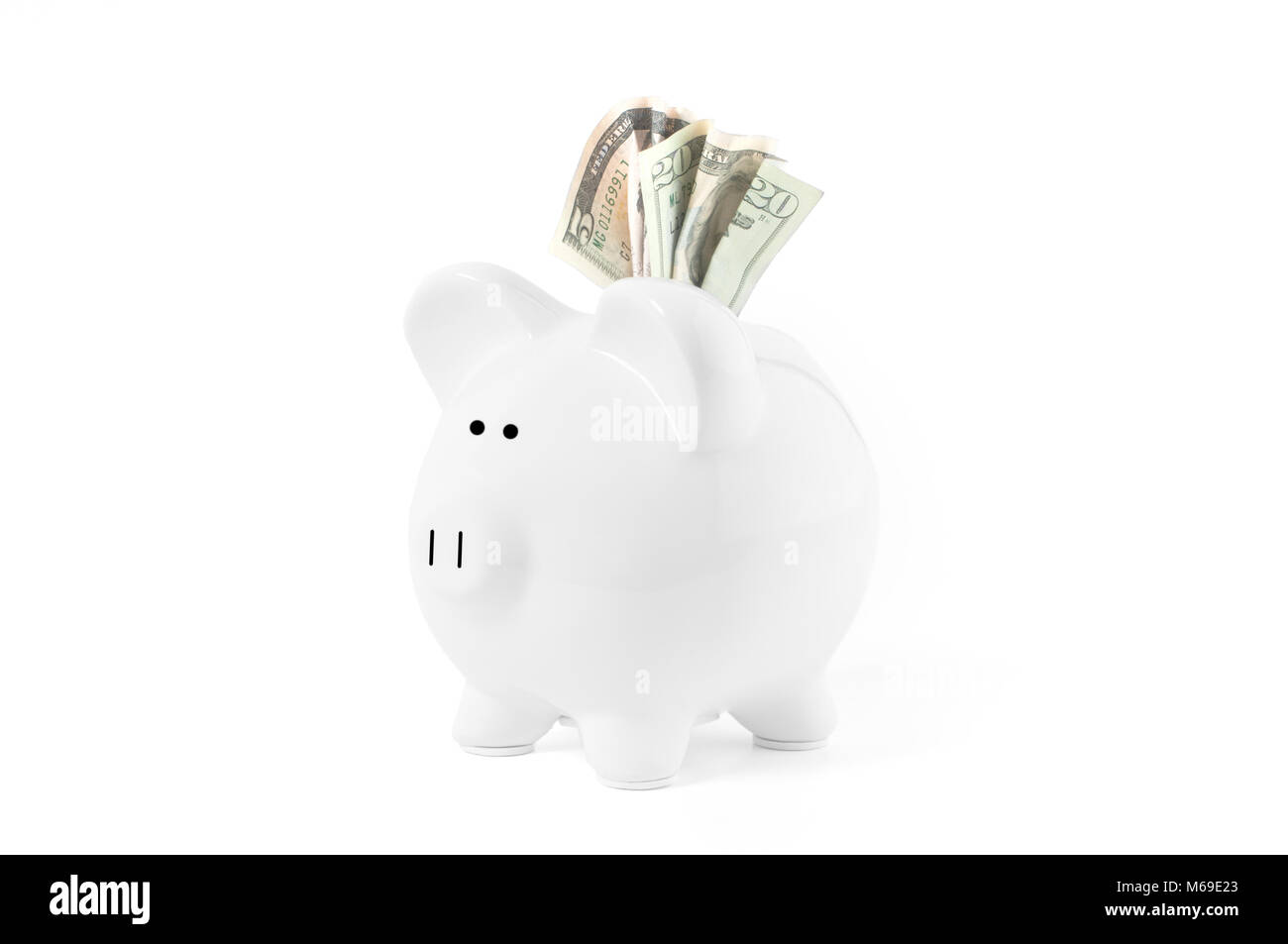 Savings concept. Piggy bank and dollar banknotes on white background ...