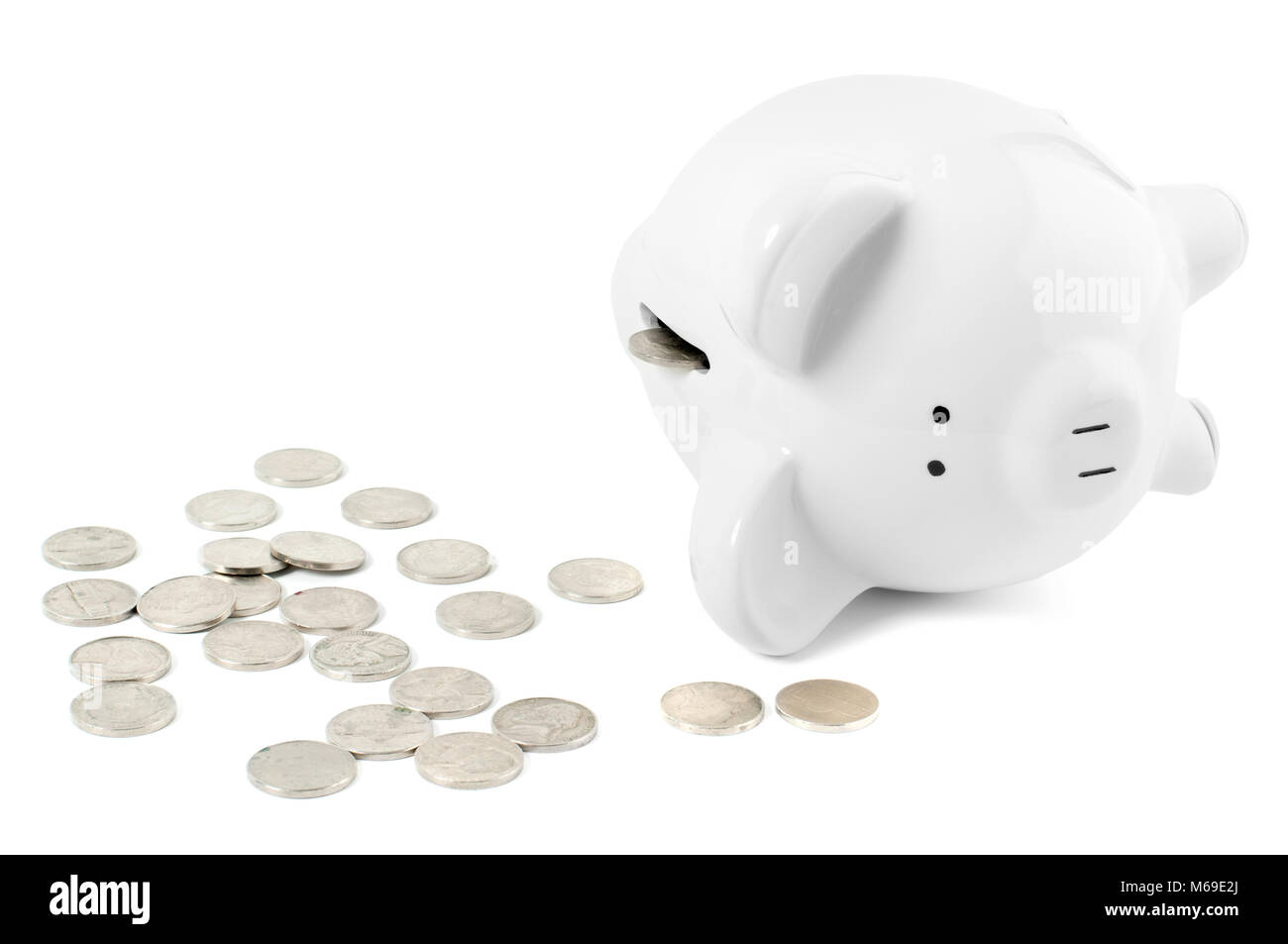 Empty piggy bank and coins on white background Stock Photo - Alamy