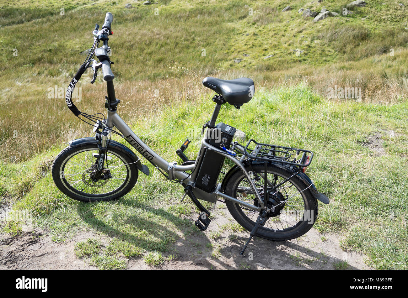 A FreeGo Folder battery power-assisted bicycle parked in Cumbria UK Stock  Photo - Alamy
