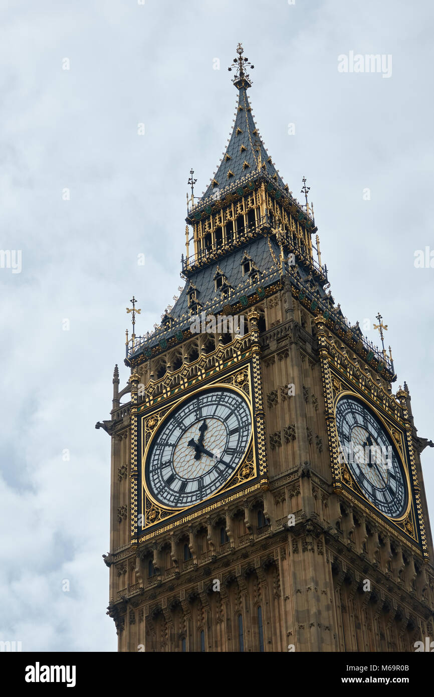 The clock tower of Big Ben in London shows the time of 12:23. Stock Photo