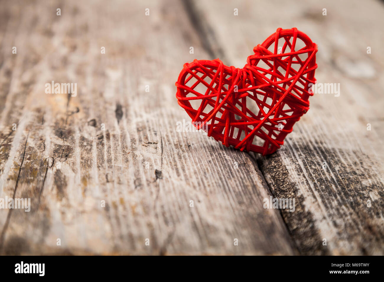 Red heart on an old wooden background. Greeting card for Valentine's ...