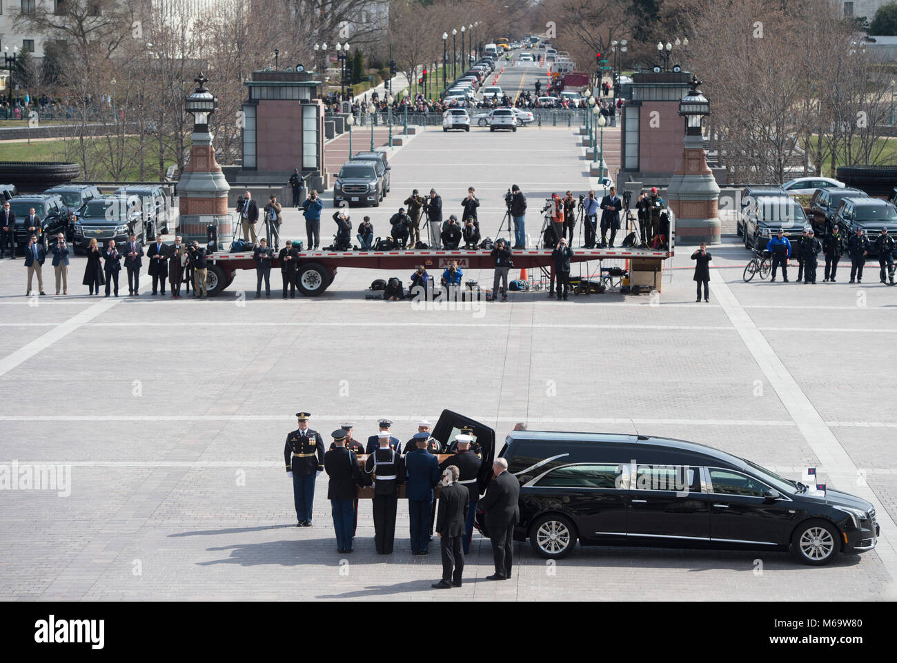 The casket of Reverend Billy Graham arrives at the US Capitol in Washington, DC, February 28, 2018, prior to a Lying in Honor ceremony in the Capitol Rotunda. Credit: Saul Loeb/Pool via CNP - NO WIRE SERVICE · Photo: Saul Loeb/Consolidated News Photos/Saul Loeb - Pool via CNP Stock Photo