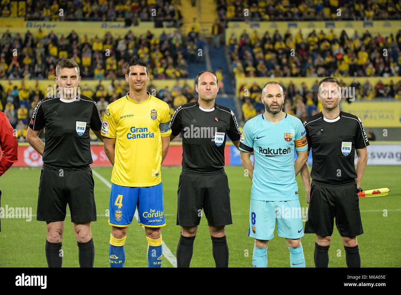 Gran Canaria, Spain. 1st March, 2018. UD Las Palmas v FC Barcelona, La  Liga, Spain, Mar. 1th 2018 captains of the two teams with the referees  during the Santander League (La Liga)