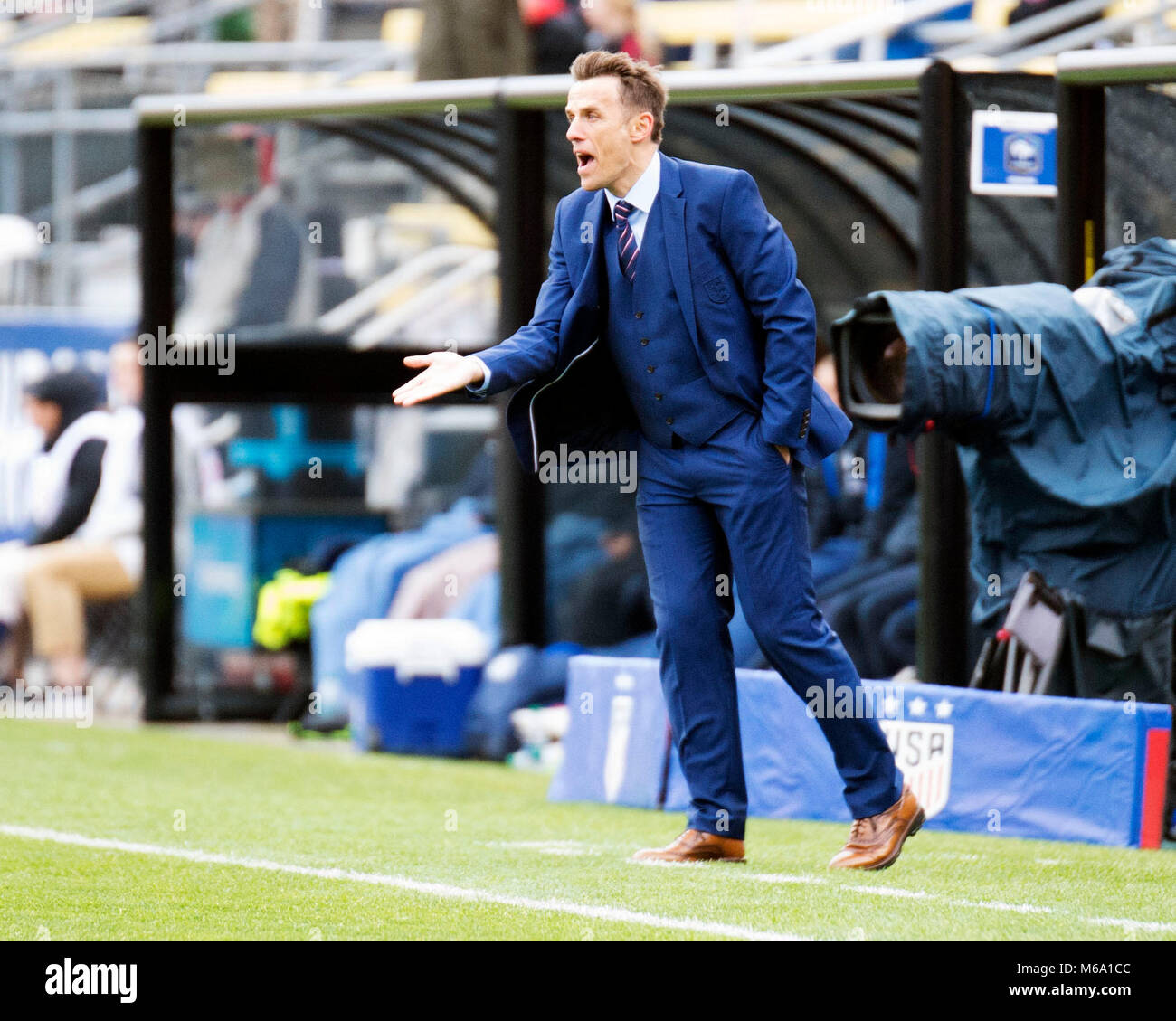 Columbus, Ohio, USA. March 1, 2018: England head coach Phil Neville coaches his tem from the sideline against France during their match at the SheBelieves Cup in Columbus, Ohio, USA. Brent Clark/Alamy Live  News Stock Photo