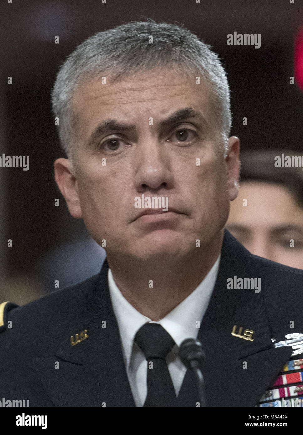 Washington, District of Columbia, USA. 1st Mar, 2018. Lieutenant General Paul M. Nakasone, United States Army, testifies before the US Senate Committee on Armed Services on his nomination to be General And Director, National Security Agency/Chief, Central Security Service/Commander, United States Cyber Command on Capitol Hill in Washington, DC on Thursday, March 1, 2018. If confirmed, Nakasone will replace US Navy Admiral Mike Rogers, who will be retiring.Credit: Ron Sachs/CNP Credit: Ron Sachs/CNP/ZUMA Wire/Alamy Live News Stock Photo