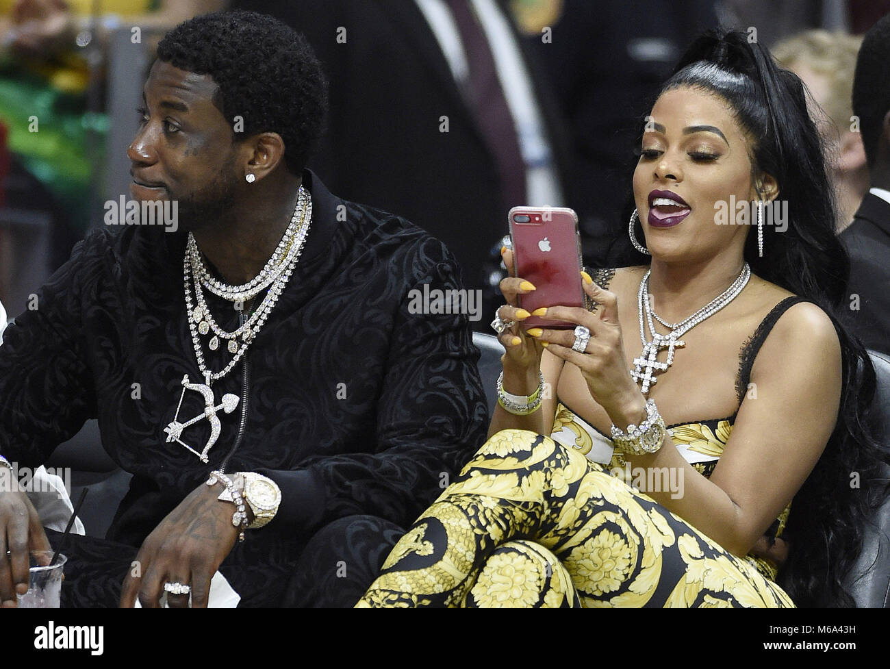 Miami, FL, USA. 01st Mar, 2018. Rapper Gucci Mane and his wife Keyshia  Ka'Oir watch the Los Angeles Lakers against the Miami Heat NBA game at the  AmericanAirlines Arena on March 1,