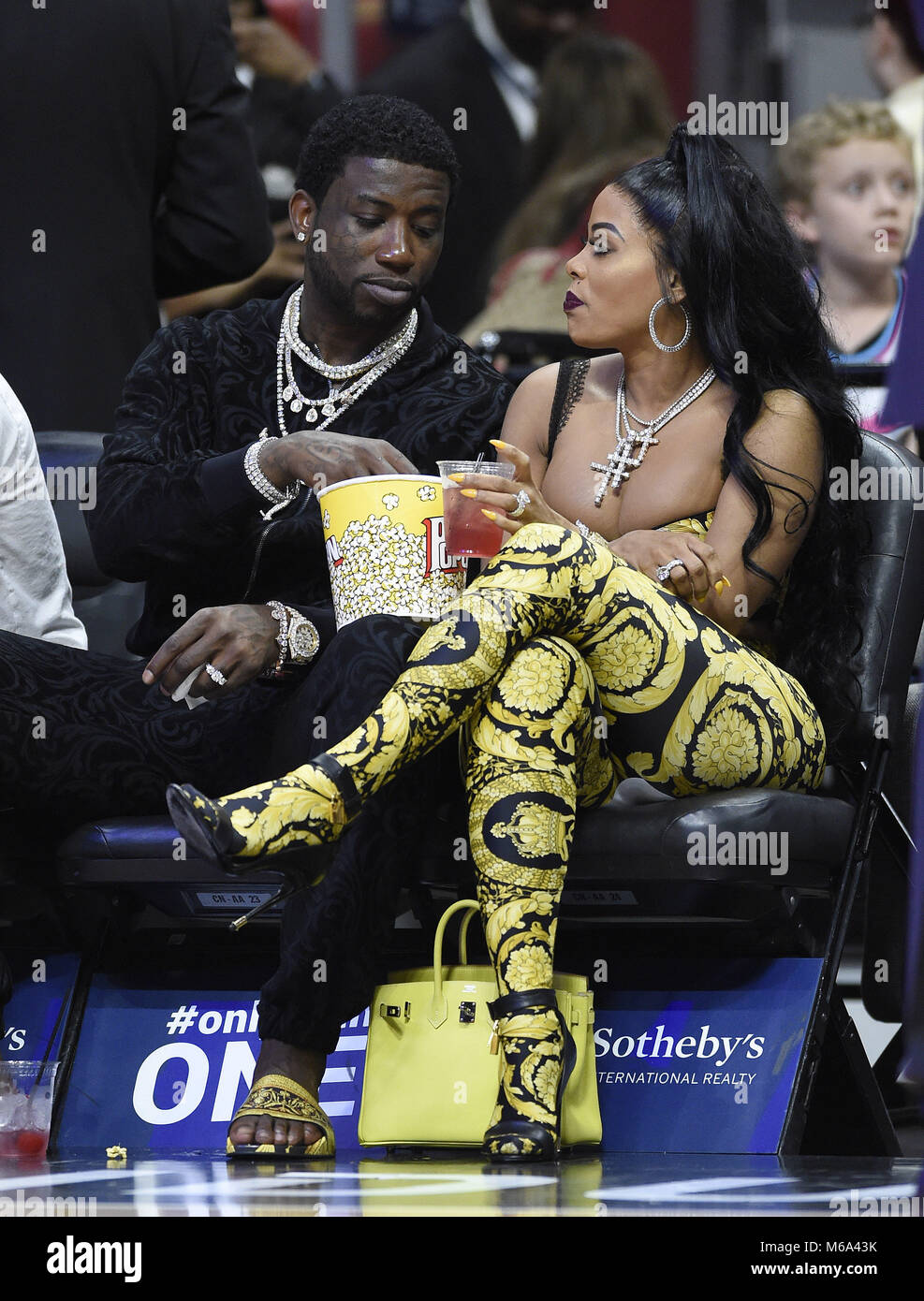 Miami, FL, USA. 01st Mar, 2018. Rapper Gucci Mane and his wife Keyshia  Ka'Oir watch the Los Angeles Lakers against the Miami Heat NBA game at the  AmericanAirlines Arena on March 1