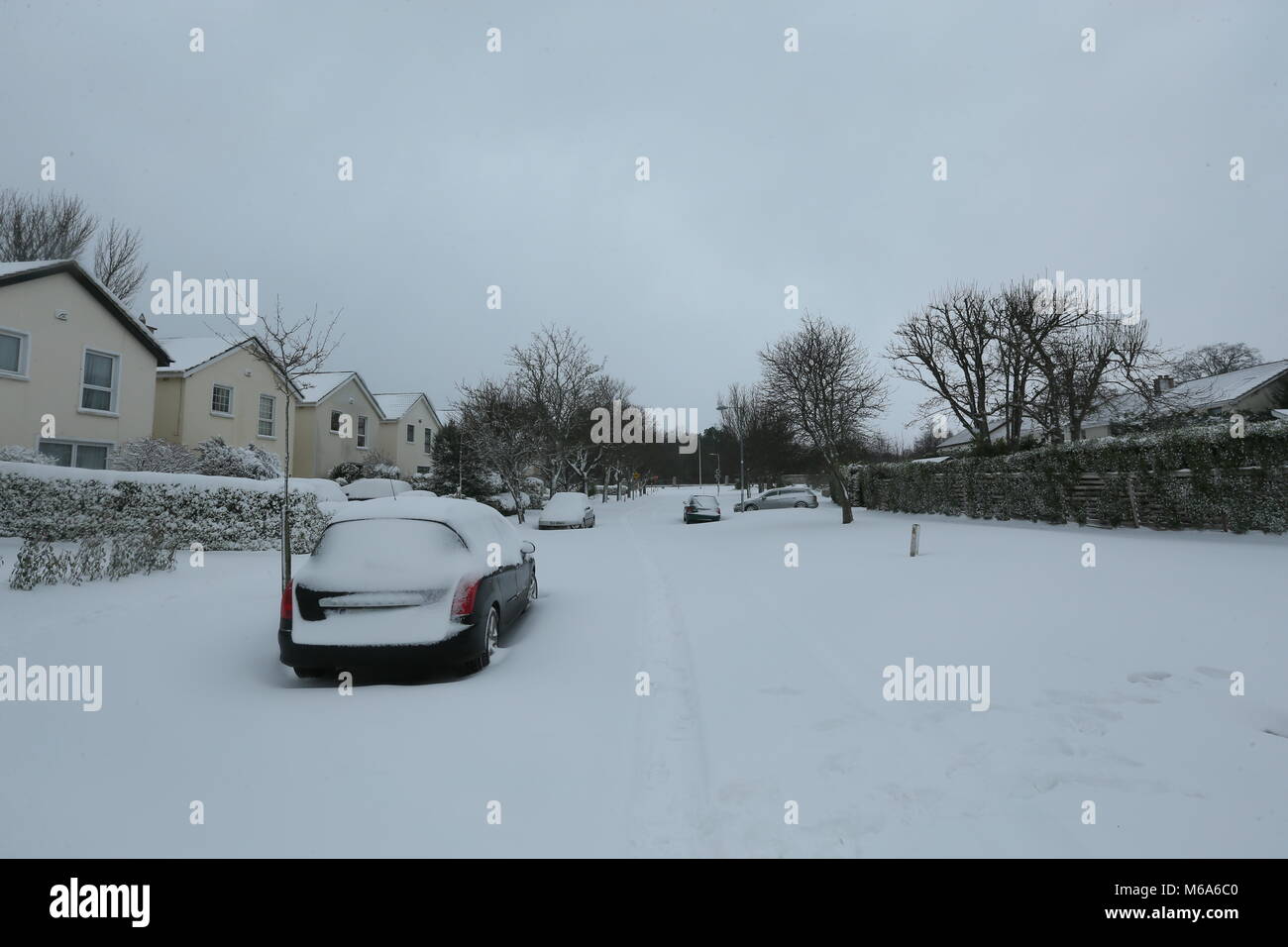 Dublin, Ireland. 2nd Mar, 2018. A Dublin street covered in snow. Image from Ballinteer in  Dublin, Ireland amid status red bad weather conditions during Storm Emma. Ireland goes into lock down as Storm Emma batters the country with heavy snowfall and blizzards. Credit: Brendan Donnelly/Alamy Live News Stock Photo