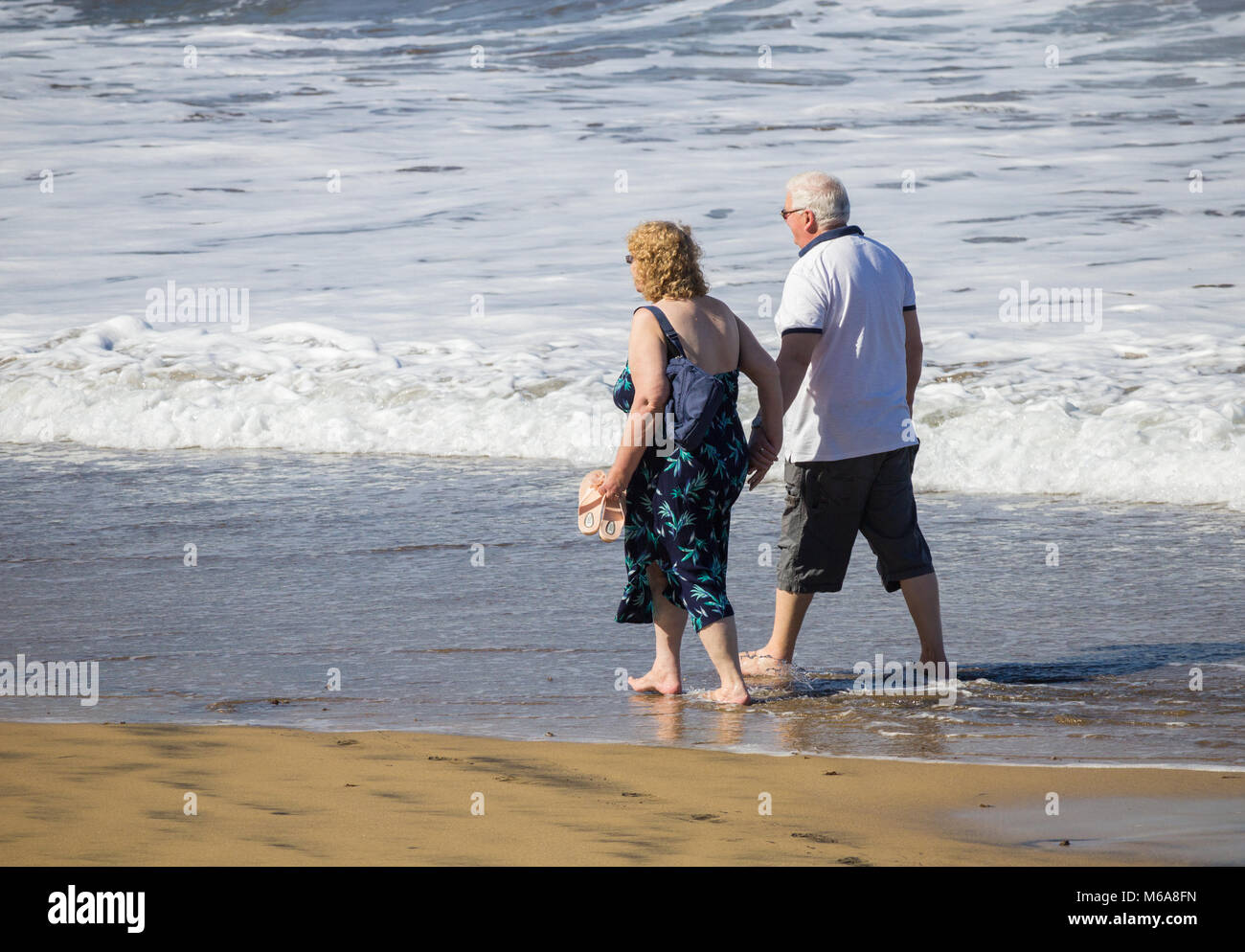 Elderly british couple abroad on holiday hires stock photography and