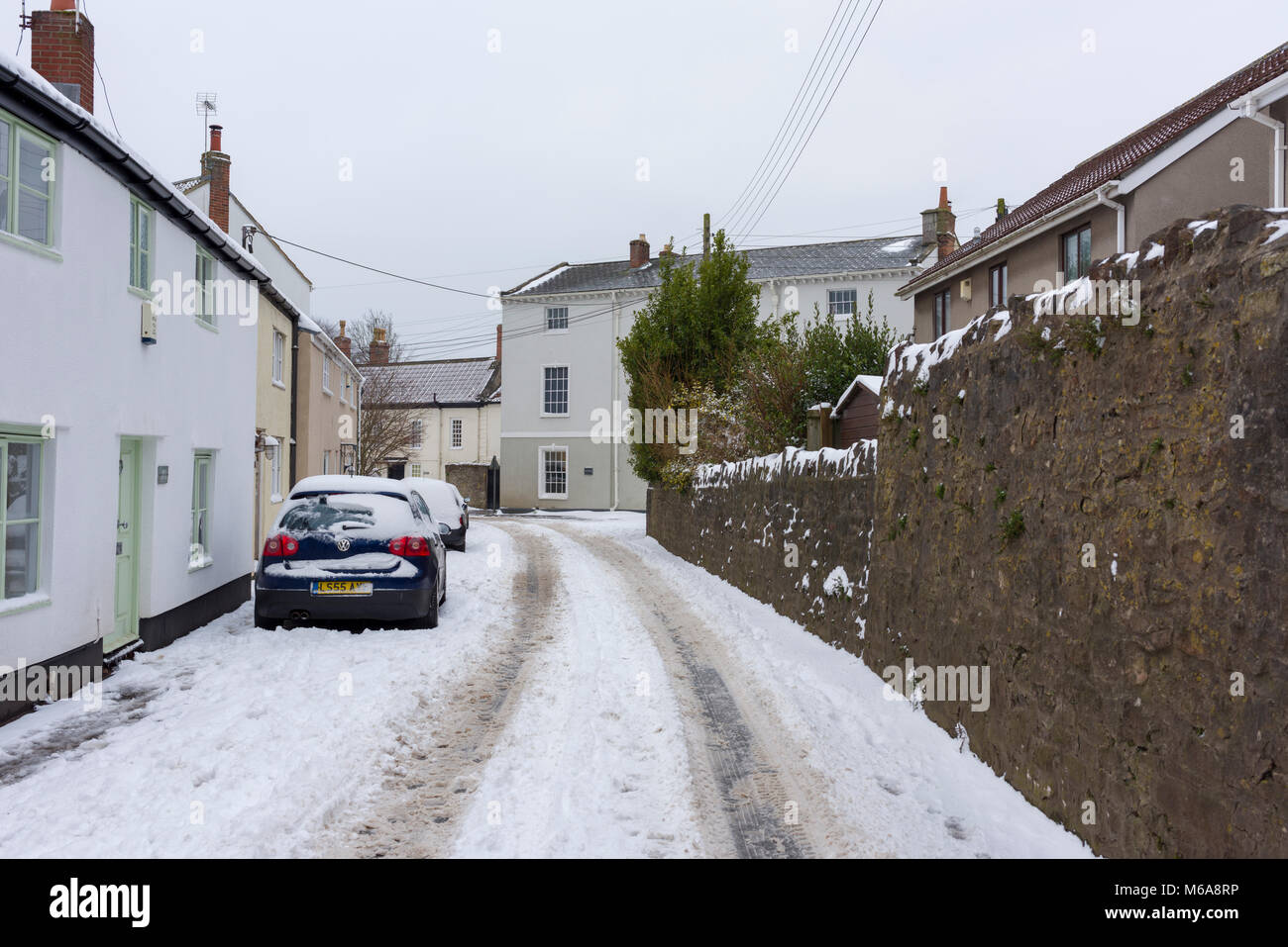 A street covered in snow in the rural village of Wrington, North ...