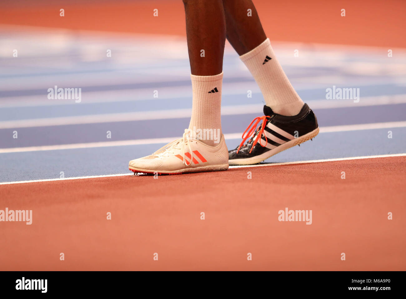 March 1, 2018 - Birmingham, United Kingdom - A track athlete wears  different coloured adidas spikes during the men's high jump at the IAAF  World Indoor Championships in Birmingham. (Credit Image: ©