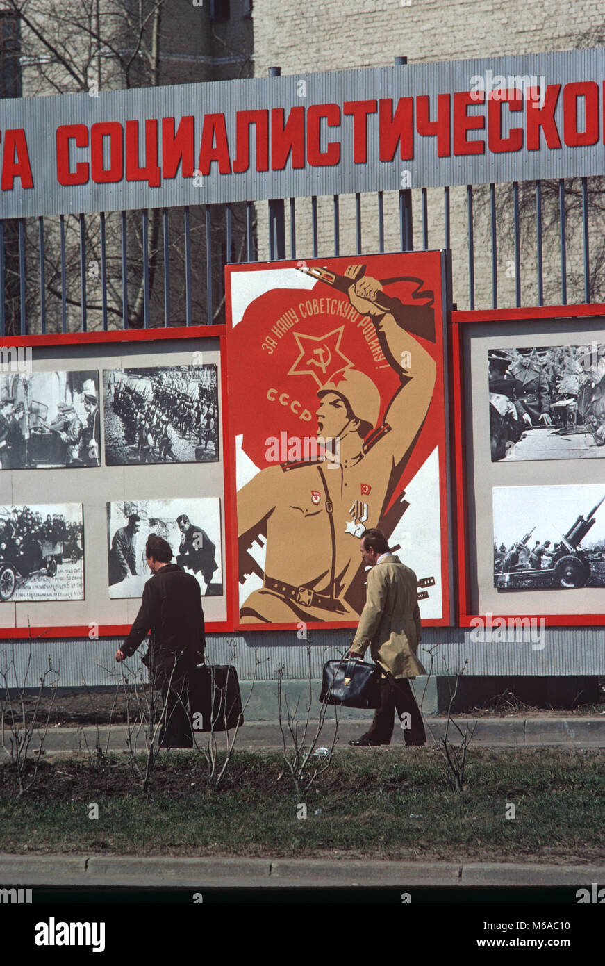 Men Walking Infront Of Russian Army Recruitment Poster Moscow Russia