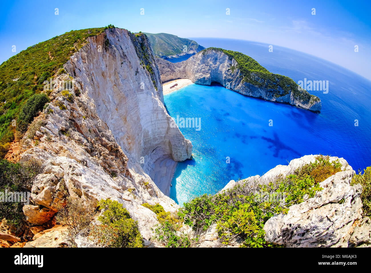 Zakynthos shipwreck beach. Navagio Bay panorama with no boats and clear waters. Touristic attraction. Stock Photo