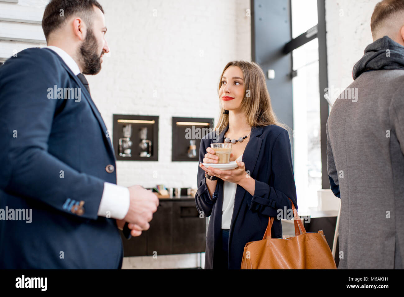 Group of businessmen suits hi-res stock photography and images - Alamy