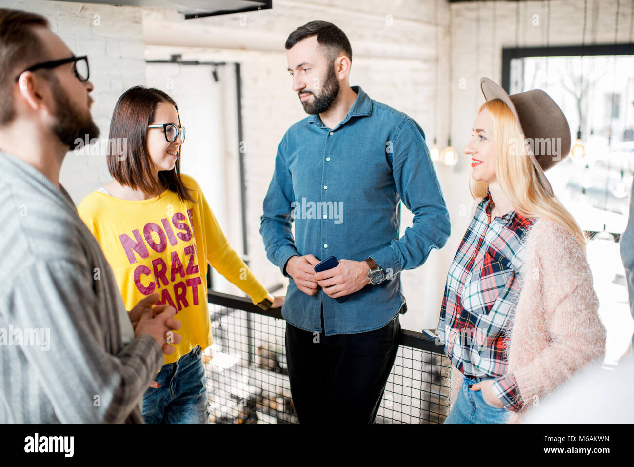Breaktalk Visiting Friends talking during the break in the conference hall Stock Photo - Alamy