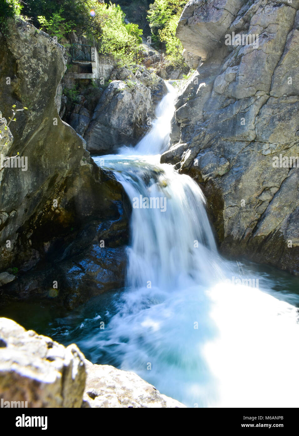 Zeus waterfall in the Olymp Mountain in Greece. Tourist attraction. Stock Photo