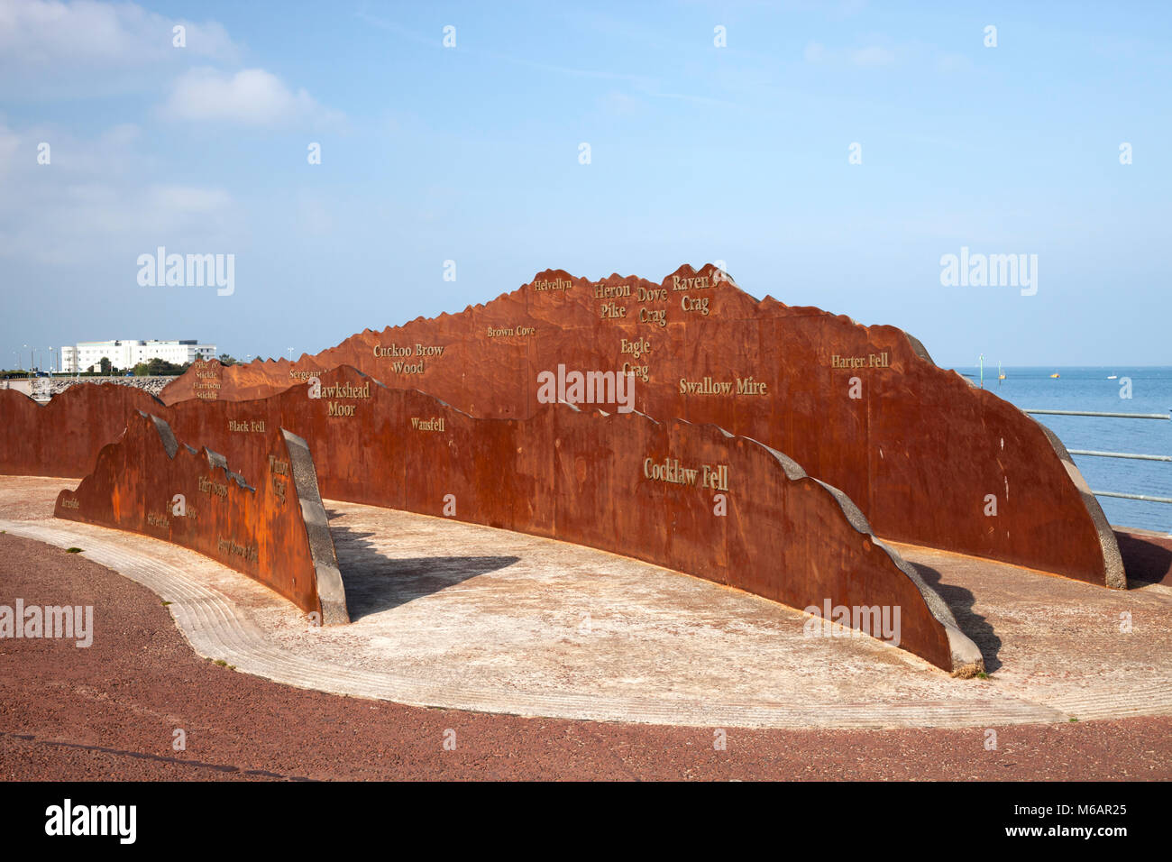 Morecambe Promenade with cast iron sculpture depicting the hills of the