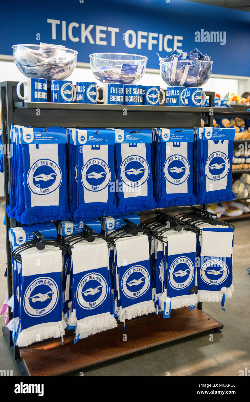 photos of the display of football kit and merchandise in the club shop