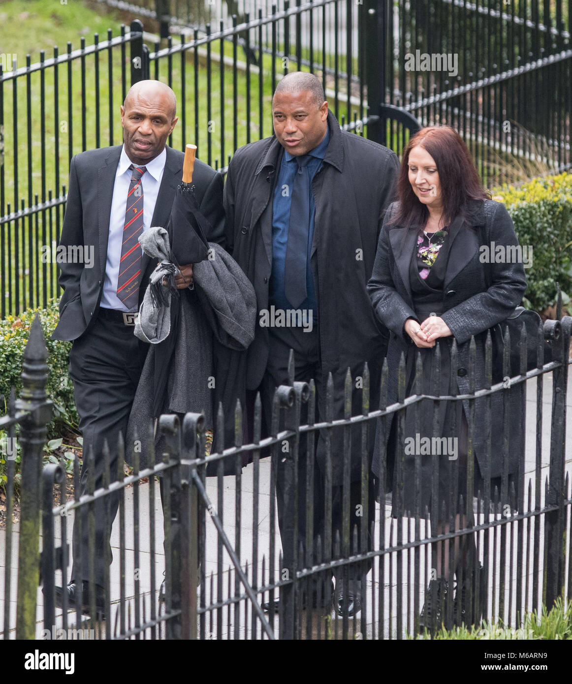 Watford former players Luther Blissett (left) & John Barnes arrive at the Funeral of Graham Taylor  at St Mary's Church, Church Street, England on 1 F Stock Photo
