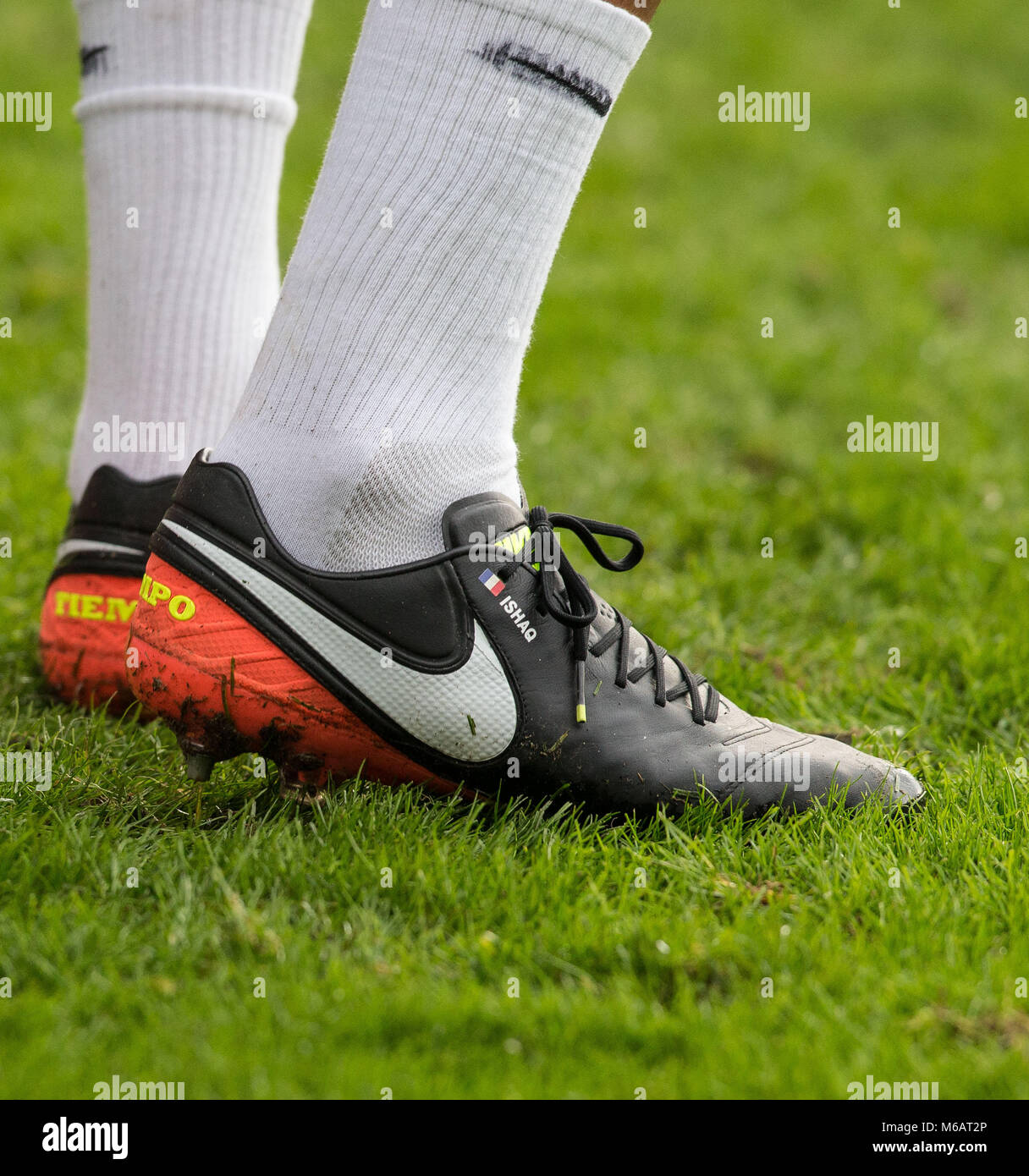 Watford Defender Younes Kaboul nike football boots displaying ISHAQ & the  french flag during the FA Cup fourth round match between Millwall and  Watfor Stock Photo - Alamy