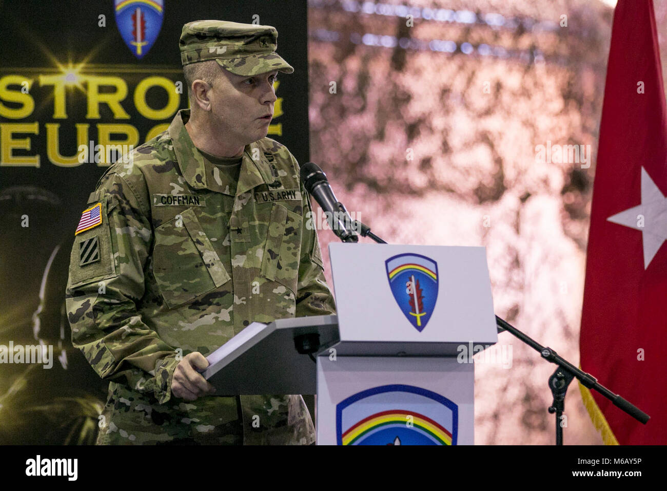 Brig. Gen. Richard R. Coffman, the incoming Mission Command Element commander, gives a speech to the Soldiers of 1st Infantry Division, Fort Riley, Kansas and 4th Infantry Division, Fort Carson, Colorado, during a transfer of authority ceremony held in Poznan, Poland, Feb. 28, 2018. (U.S. Army Stock Photo