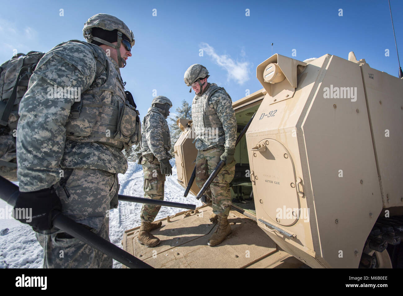 U.S. Army Reserve Soldiers from the 366th Mobility Augmentation Company, remove equipment from an M113 Armored Personnel Carrier during Operation Cold Steel II at Fort McCoy, Wis., Feb. 25, 2018. Operation Cold Steel is the U.S. Army Reserve’s crew-served weapons qualification and validation exercise to ensure America’s Army Reserve units and Soldiers are trained and ready to deploy on short-notice as part of Ready Force X and bring combat-ready and lethal firepower in support of the Army and our joint partners anywhere in the world. (U.S. Army Reserve Stock Photo