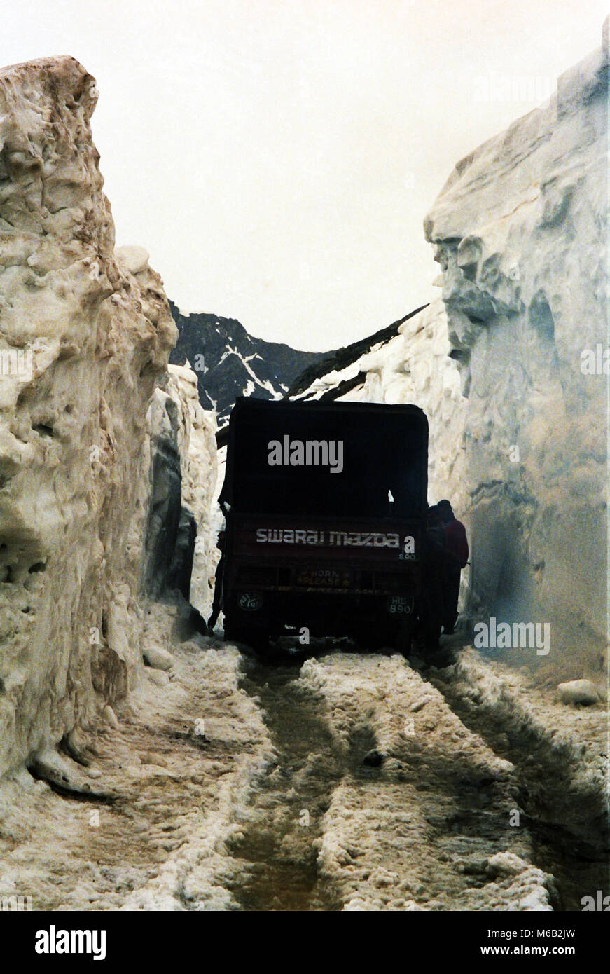 Clearing the Rohtang Pass on the Himalayan road connecting The Kulu valley and Lahaul and Spiti in  Himachal Pradesh. Stock Photo